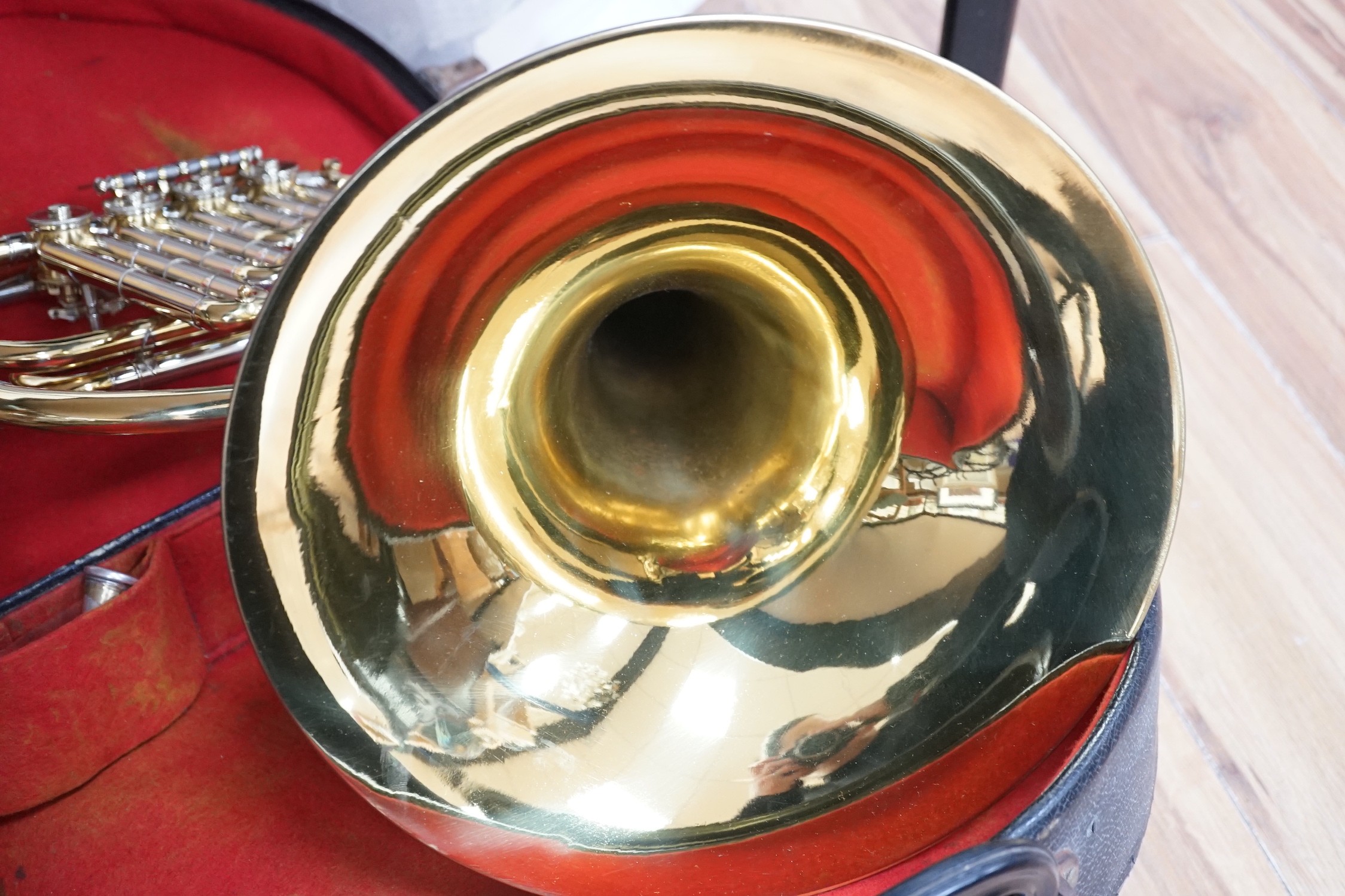 A cased French horn